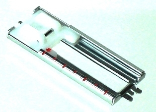 Elna 395273-00 | 2003 Sliding Buttonhole Foot | Category A 